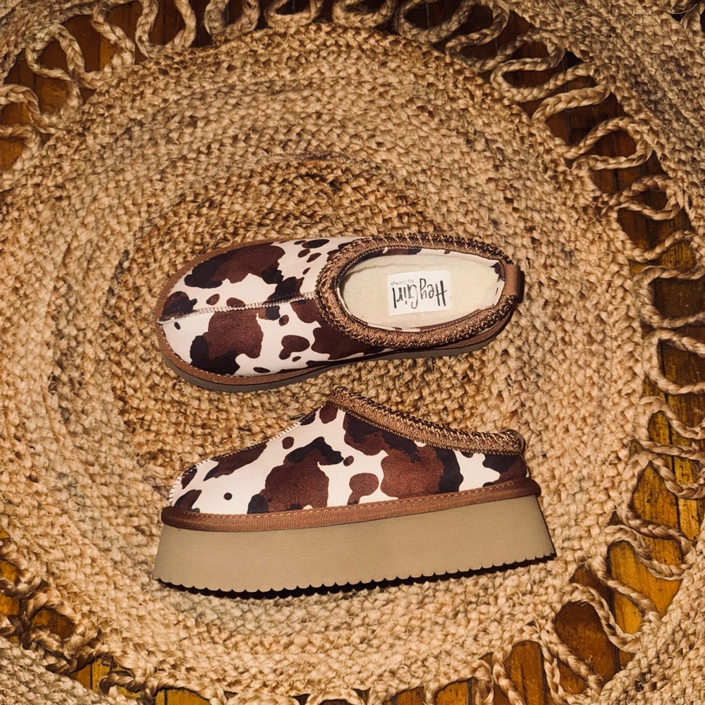 Corky’s Cow Print Slip-On Shoes